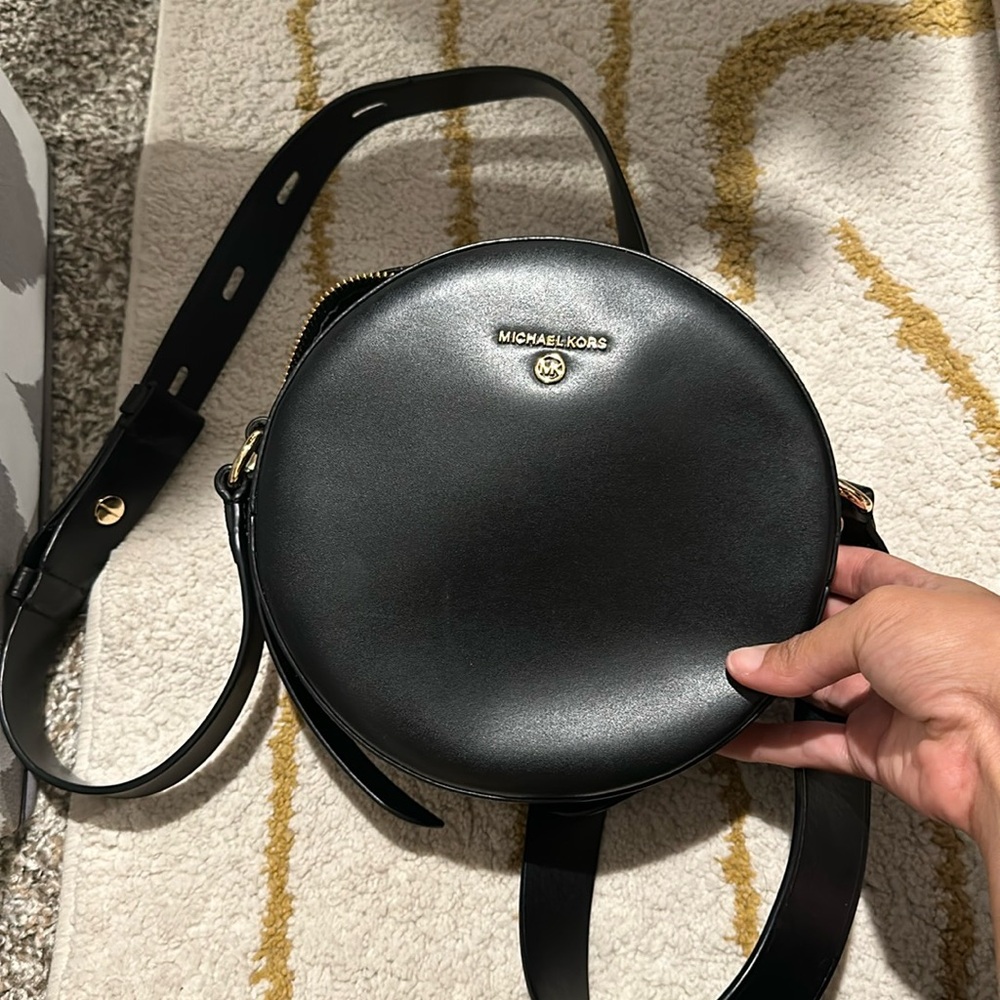 Michael Kors black circular crossbody
